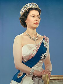 Elizabeth facing right in a half-length portrait photograph