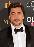 A picture of Javier Bardem smiling towards the camera