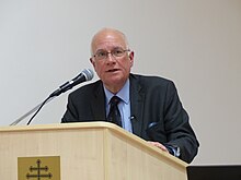 Robin Harris holding lecture at the Danube Institute