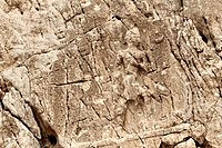 Sarpol-e Zahab, relief I. Beardless warrior with axe, trampling a foe. Sundisk above. A name "Zaba(zuna), son of ..." can be read. He is usually considered as a ruler of the Lullubi,[14][15] but he could be a ruler of the Kingdom of Simurrum, son of Iddin-Sin.[16]
