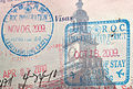 美國護照上蓋了在高雄國際機場的中华民国出入境蓋章。