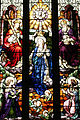 Stained glass window at St. Michael's Cathedral (Toronto) depicts Coronation of the Virgin.