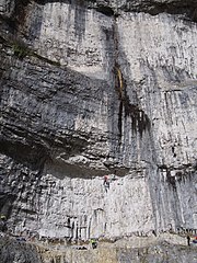 Cliff face, with climbers