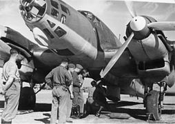 German soldiers loading a Heinkel He 111 of the Condor Legion with bombs