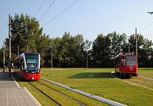 CAF Urbos and Tatra KT4 trams at Block 45