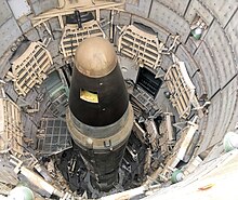 An image of a large Titan Nuclear Missile in the centre of a nuclear silo