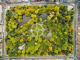 Aerial view of Dublin's St Stephen's Green, showing greenery, paths, and a pond