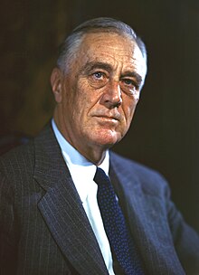 Franklin Roosevelt, 62, has graying hair and faces the camera.