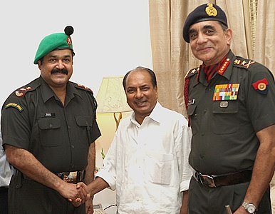 Mohanlal (left) with the then Defence Minister A. K. Antony and Chief of the Army Staff Deepak Kapoor after joining the TA in 2009.