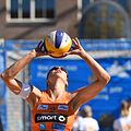 Image 25A player hand sets the ball (from Beach volleyball)