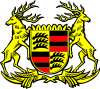 左がシュトゥットガルト市の紋章、右がヴュルテンベルク自由人民州の紋章（中心のクレストの部分は1945年から1952年にかけて存在したヴュルテンベルク＝ホーエンツォレルン州の紋章に継承された）