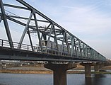 厚木 - 本厚木間の相模川橋梁を渡る1000形（2007年3月2日）
