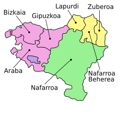 巴斯克地區分成七個部份，目前分屬於西法兩國。黃色部分爲法國境内的北巴斯克，綠色部分爲西班牙的纳瓦拉，粉色部分是西班牙的巴斯克自治區