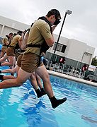 Entering the water during the pool phase of the Special Forces Underwater Operations School at Naval Air Station Key West.