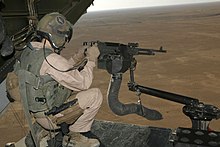 M240通用機槍 mounted on V-22 loading ramp with a view of Iraq landscape with the aircraft in flight