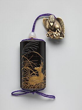 Inro with design of eulalia grass and deer, with eagle netsuke, Edo period, 19th century