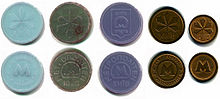 Small plastic coin tokens used in the Kyiv Metro