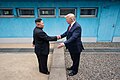 Chairman Kim shakes hands with U.S. President Donald Trump at the Joint Security Area of the Korean Demilitarized Zone, June 30, 2019.