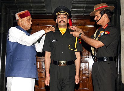 The Chief of Army Staff General Dalbir Singh conferring the rank of Lieutenant in the TA on Anurag Thakur in 2016.