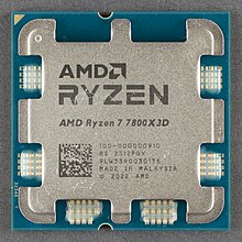 The front of a Ryzen 7 7800X3D CPU, showing the heatspreader with the information imprint on it