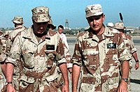 U.S. President George H. W. Bush and Brigadier General Thomas Mikolajcik wearing DBDUs as they visit Mogadishu Airport in January 1993