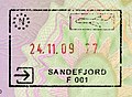 英國護照上的挪威桑德爾福德機場入境印章。