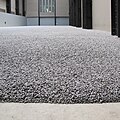 Sunflower seeds (graines de tournesol). Ai Weiwei, 2011, Installation à la Tate Modern. Des millions de petites porcelaines de Jingdezhen peintes à la main[N 26]