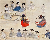 Dancing together holding with two swords, depicting two Kisaeng performing together in Korea sometime after 1805. from Hyewon pungsokdo, held by the Gansong Art Museum in Seoul