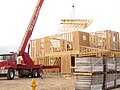 A set of trusses placed atop a home under construction
