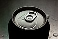 Aluminum drinks can with stay-tab easy-opening. Note the can is narrowed at the top to allow for a smaller "end"